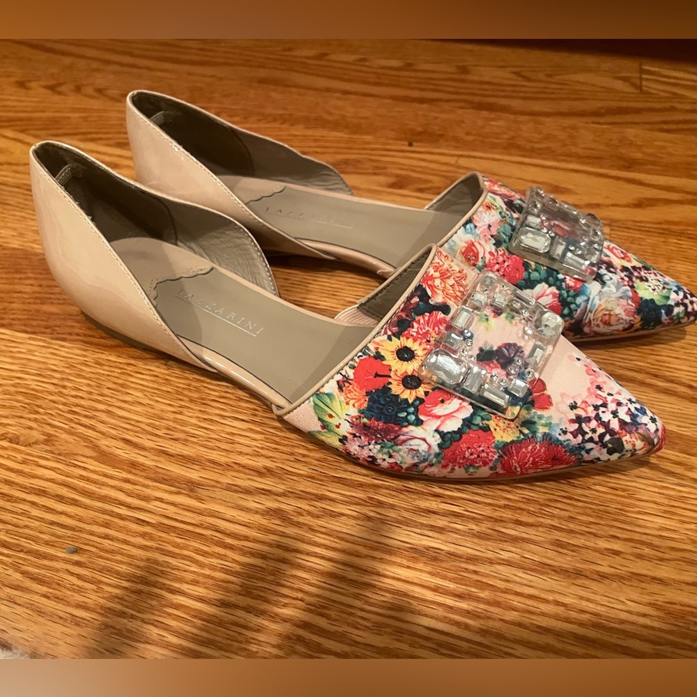 Super cute European made pink floral ballet flats worn once.